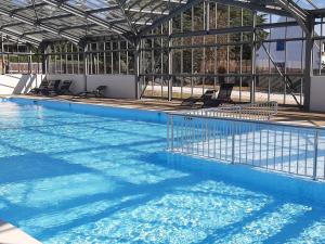 Chalets Charmant Chalet 3 Chambres avec Piscine Couverte a 10 min de la Plage de La Baule - FR-1-783-18 : photos des chambres