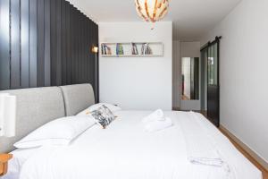 Appartements Spacieux appartement - Parking - Piscine - BV : photos des chambres