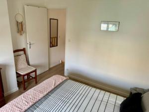 Appartements ꧁ La petite Maison chaleureuse de Jouars ꧂ : photos des chambres