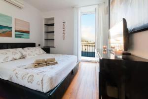 Trilocale sulla Spiaggia - Parcheggio Privato