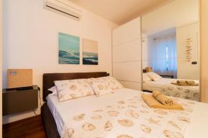 Trilocale sulla Spiaggia - Parcheggio Privato