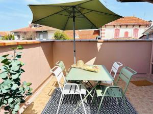 Appartements La casa magique, bulle enchantee, 100m de la plage : photos des chambres