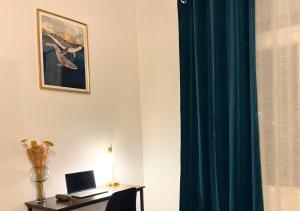 Appartements Le Charme D-Antan : photos des chambres