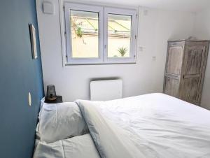 Maisons de vacances Agreable maison renovee en hyper centre avec patio : photos des chambres