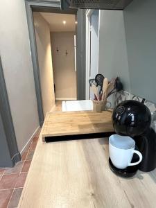 Appartements Au pied du chateau : photos des chambres