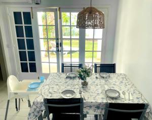 Apartamento Playa Xoriguer con piscina y jardin