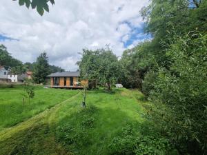 Holzhaus mit Kamin - Am Forellenfluss