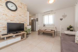 Appartement in Privlaka mit Grill, Garten und Terrasse