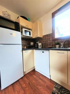 Residence Le Hameau Du Puy - Chalets pour 6 Personnes 874 : photos des chambres