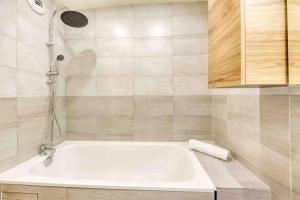 Appartements *Le Sympa* Proche Paris/stade de France : photos des chambres
