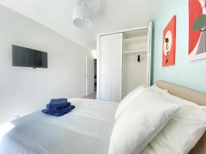 Appartements Cocon Urbain - T5 de charme 4 chambres - Wifi, cuisine equipee, parking privee, check-in facile, tout y est ! : photos des chambres