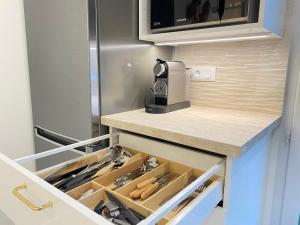 Appartements Cocon Urbain - T5 de charme 4 chambres - Wifi, cuisine equipee, parking privee, check-in facile, tout y est ! : photos des chambres