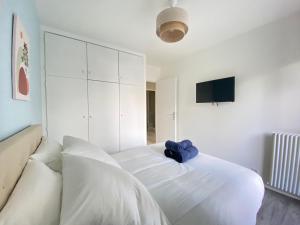 Appartements Cocon Urbain - T5 de charme 4 chambres - Wifi, cuisine equipee, parking privee, check-in facile, tout y est ! : photos des chambres
