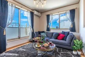 【4LDKの一軒家貸し切り！】スタイリッシュで落ち着いたインテリアのハウスで沖縄を満喫しましょう！ - Jima