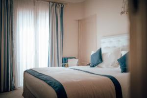 Hotels Ermitage de l'Oasis & Spa - Cannes Mandelieu : photos des chambres
