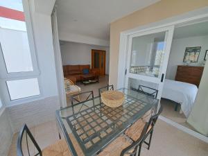 Ático primera línea de playa con vistas al Mar-Climatizado-Wifi-Parking-Solo familias