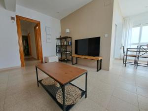 Ático primera línea de playa con vistas al Mar-Climatizado-Wifi-Parking-Solo familias