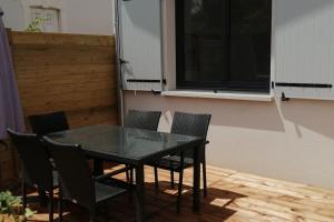 Maisons de vacances Maison neuve idealement situee. : photos des chambres