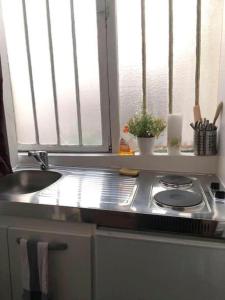 Appartements Maisonnette studio sur cour : photos des chambres