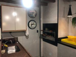 Casa com piscina área gourmet Enseada Azul