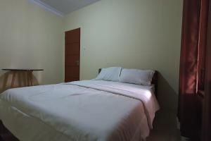 Hotel O Kost Reski 1 Near Pasar Rakyat Limbung