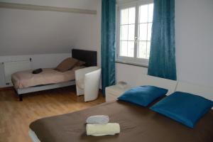 Appartements Le Magnolia : photos des chambres