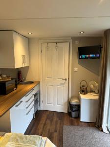 Apple tree hut, in a private garden