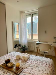 Appartements Appartement COSY proche commerces et Naval Group : photos des chambres