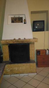 Μονοκατοικία με τζάκι σε παραδοσιακό οικισμό