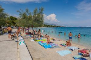 Apartment Antonio on the seafront with garden