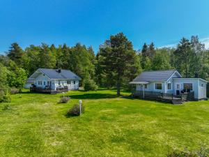 House and guest house with sauna by the sea