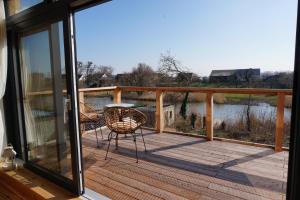 FeWo OG am Fluss mit Balkon - ein himmlischer Ausblick