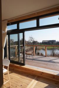 FeWo OG am Fluss mit Balkon - ein himmlischer Ausblick