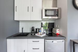 Appartements NeuvaRoom : photos des chambres