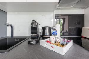 Appartements NeuvaRoom : photos des chambres