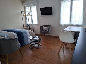 Appartements 24h course/Moto/ Oasis / Antares : photos des chambres