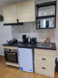 Appartements 24h course/Moto/ Oasis / Antares : photos des chambres