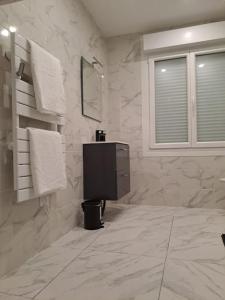 Appartements 24h course/Moto/ Oasis / Antares : photos des chambres