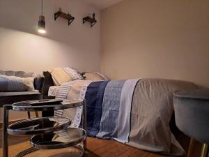 Appartements 24h course/Moto/ Oasis / Antares : photos des chambres
