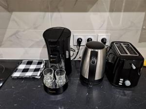 Appartements 24h course/Moto/ Oasis / Antares : photos des chambres