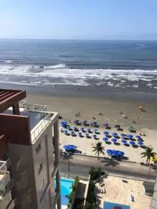 Apto charme frente para a praia - 伊塔尼亚恩