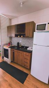 Cantinho Sol & Mar Pé na Areia frente ao Mar com churrasqueira na sacada e piscina