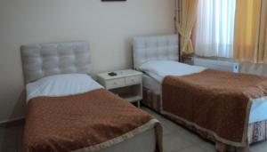 Triple Room with Shared Bathroom room in Yavuz Hotel