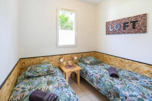 Maisons de vacances Cosy Pavillon 2chambres proche mer : photos des chambres