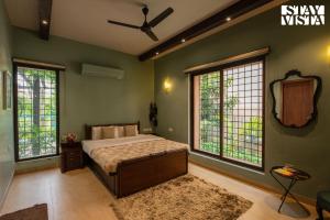 StayVista Ishva Bungalow with Pool & Lawn