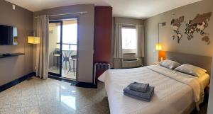 Flat Particular no Hotel Comfort Suítes com garagem