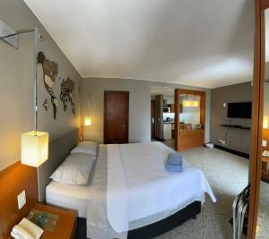 Flat Particular no Hotel Comfort Suítes com garagem