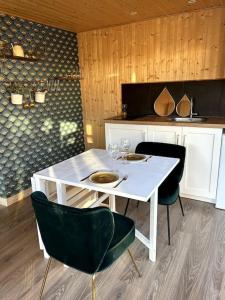 Maisons de vacances Le Nid douillet proche de la mer. La clef des paons : photos des chambres