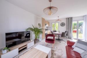 Appartements D1 Maison de Charme proche Disney Val d'Europe : photos des chambres