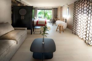 Hotels Les Tresoms Lake and Spa Resort : photos des chambres